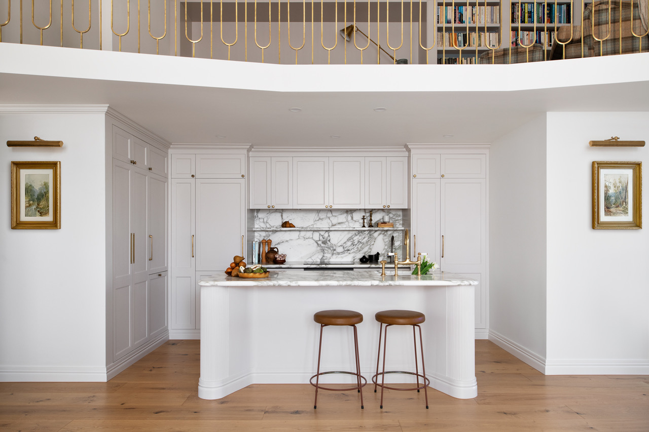 Classic shaker kitchen with marble island in a Grade II listed London townhouse renovation.