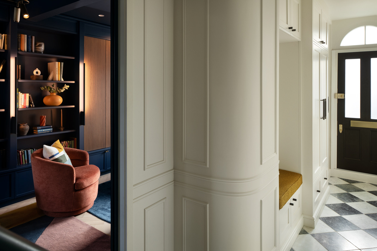 Custom heritage joinery and reading nook in a listed London home renovation project.